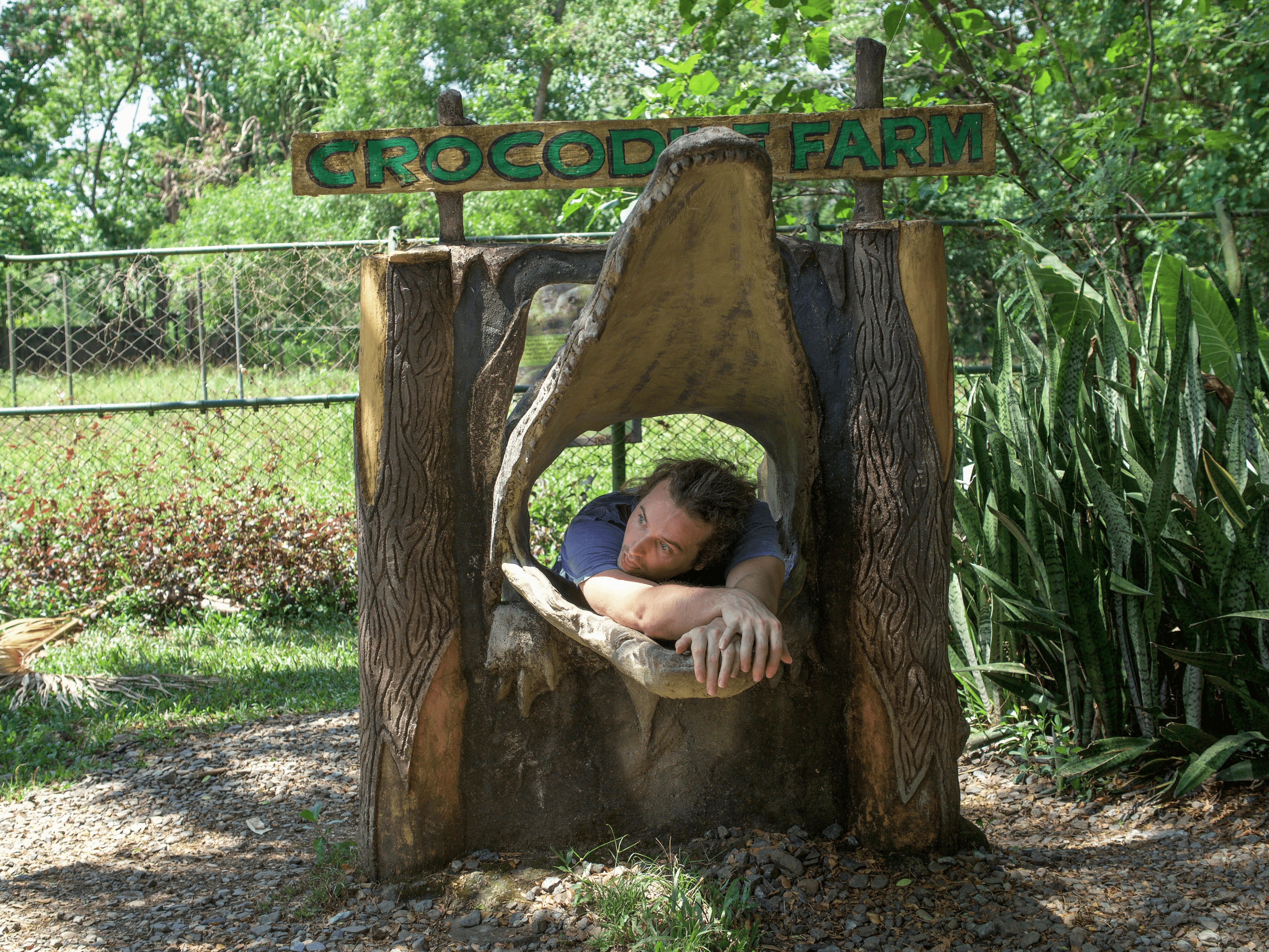 lenny through paradise stuck in crocodile mouth in puerto princesa crocodile farm palawan philippines